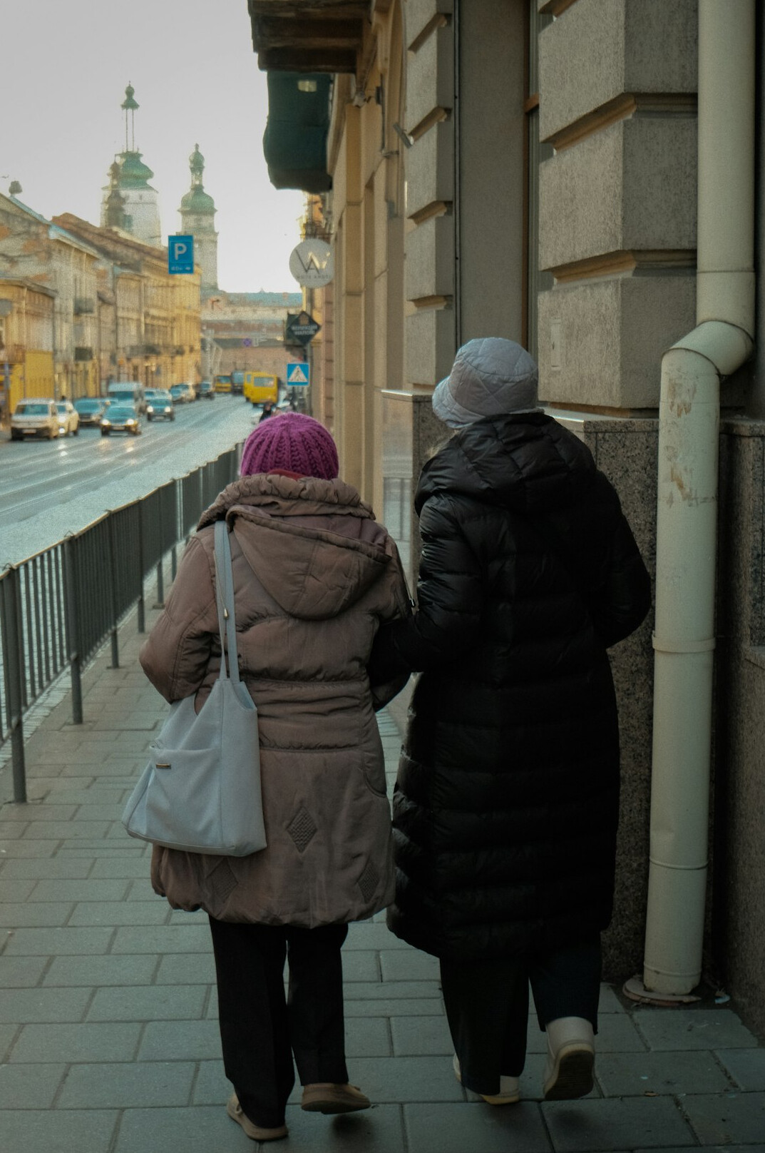 elderly people walking together