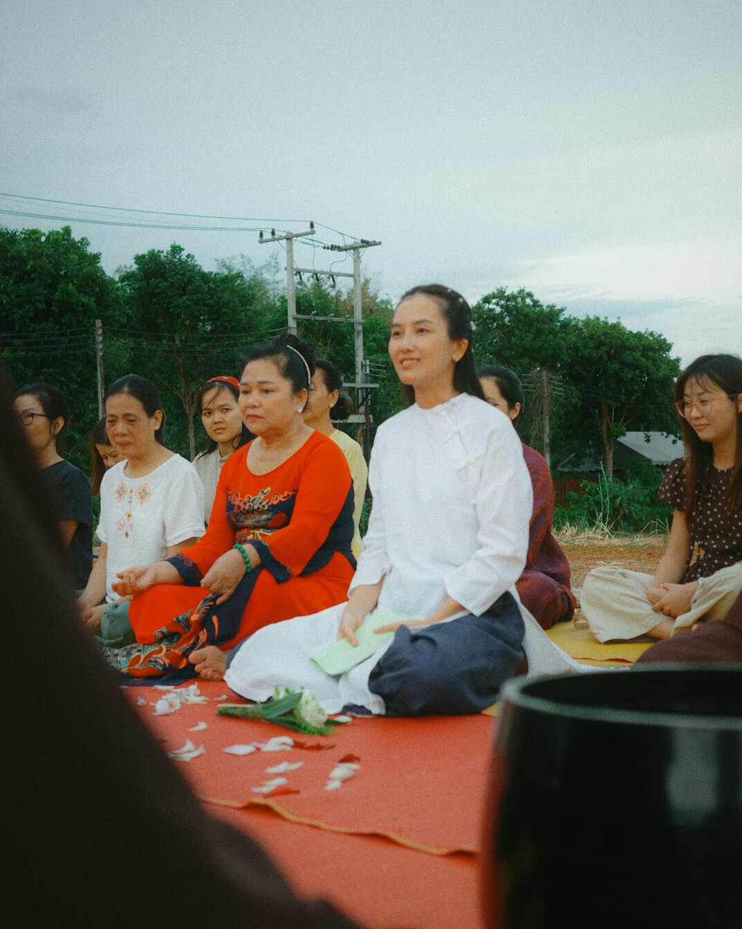 person meditating outdoors