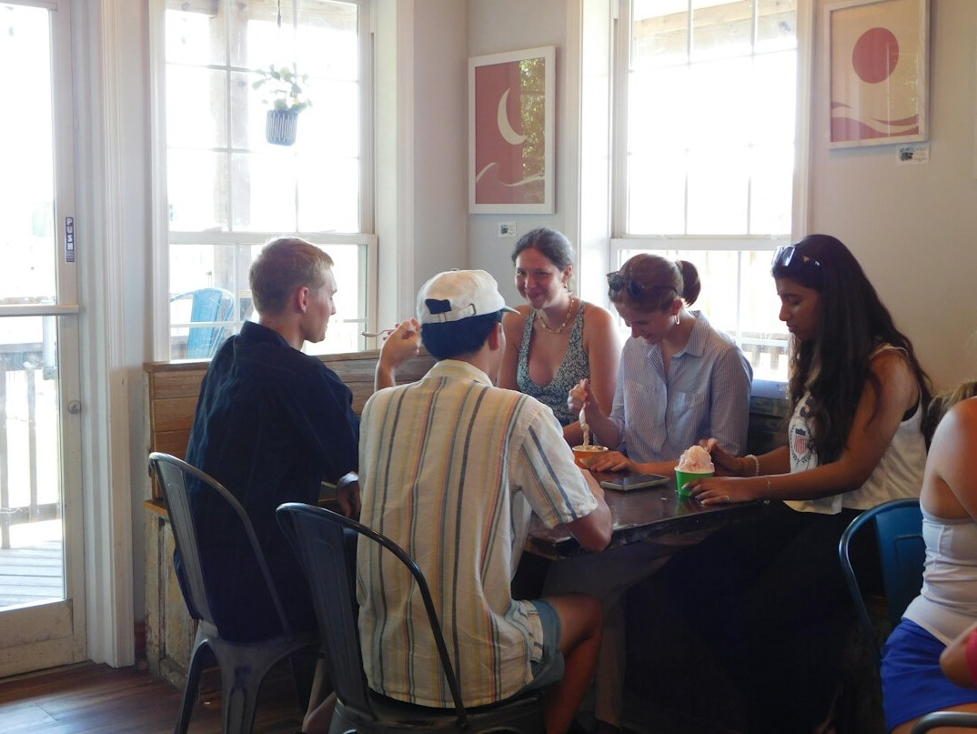 diverse people talking in cafe